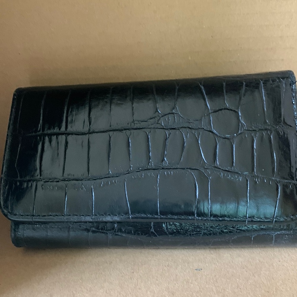 Italian calfskin trifold wallet.